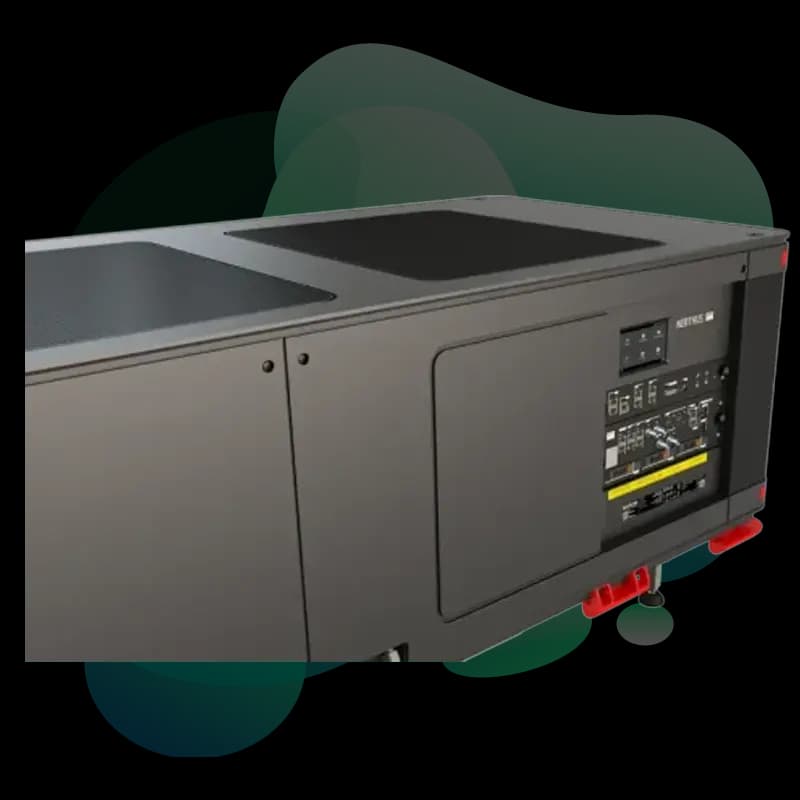 Barco Nerthus professional cinema projector angled view showing RGB laser light engine and Barco branding