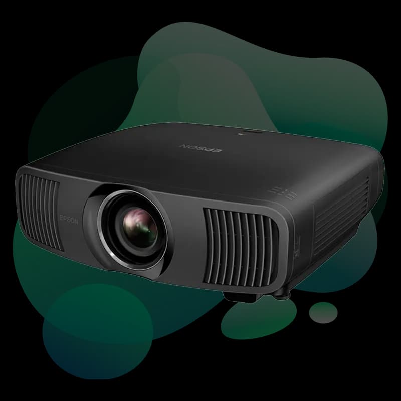 Epson EH-LS12000B 4K laser projector front three-quarter view showing motorized lens and chassis