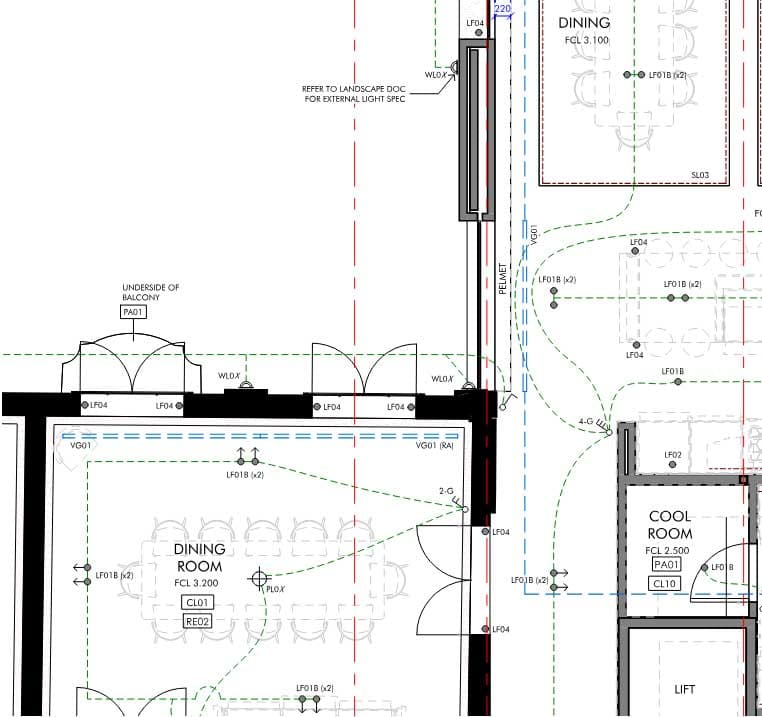 Original drawing crop with heavy architectural linework, fixture labels and crossing control routes